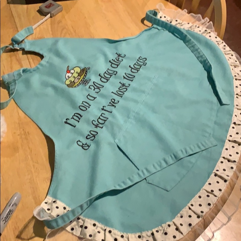 NWOT turquoise apron with front embroidery
